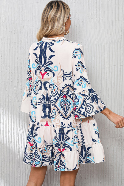 Chique witte tribal print mini-jurk met geknoopte mouwen