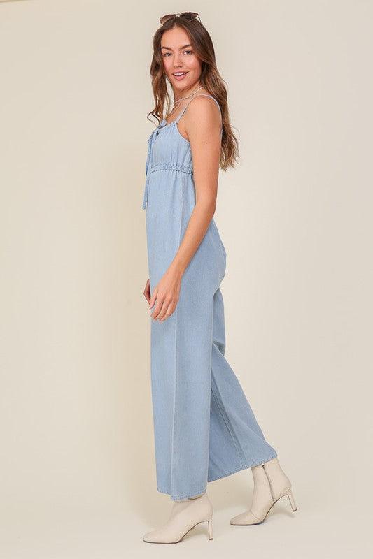 Denim Blue Sleeveless Jumpsuit With Self Jump Tie - ZyraLux