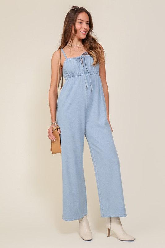 Denim Blue Sleeveless Jumpsuit With Self Jump Tie - ZyraLux