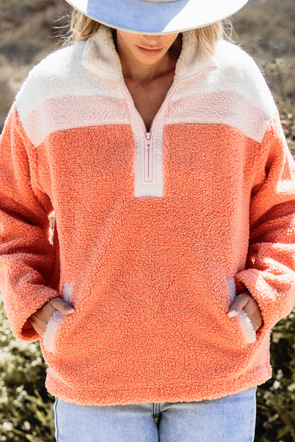 Levendig oranje Sherpa-sweatshirt met kleurblokken en trendy halfritsontwerp