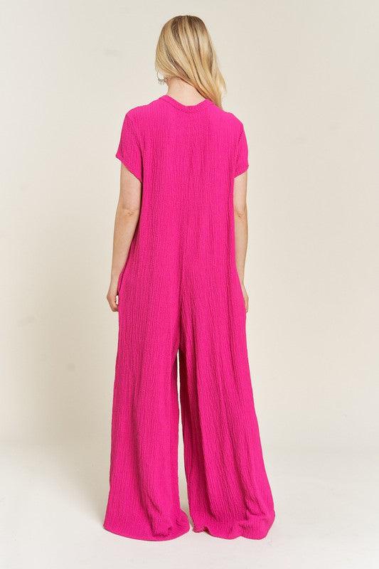 Loose Fit Fuschia Pink Textured Short Sleeve Jumpsuit - ZyraLux