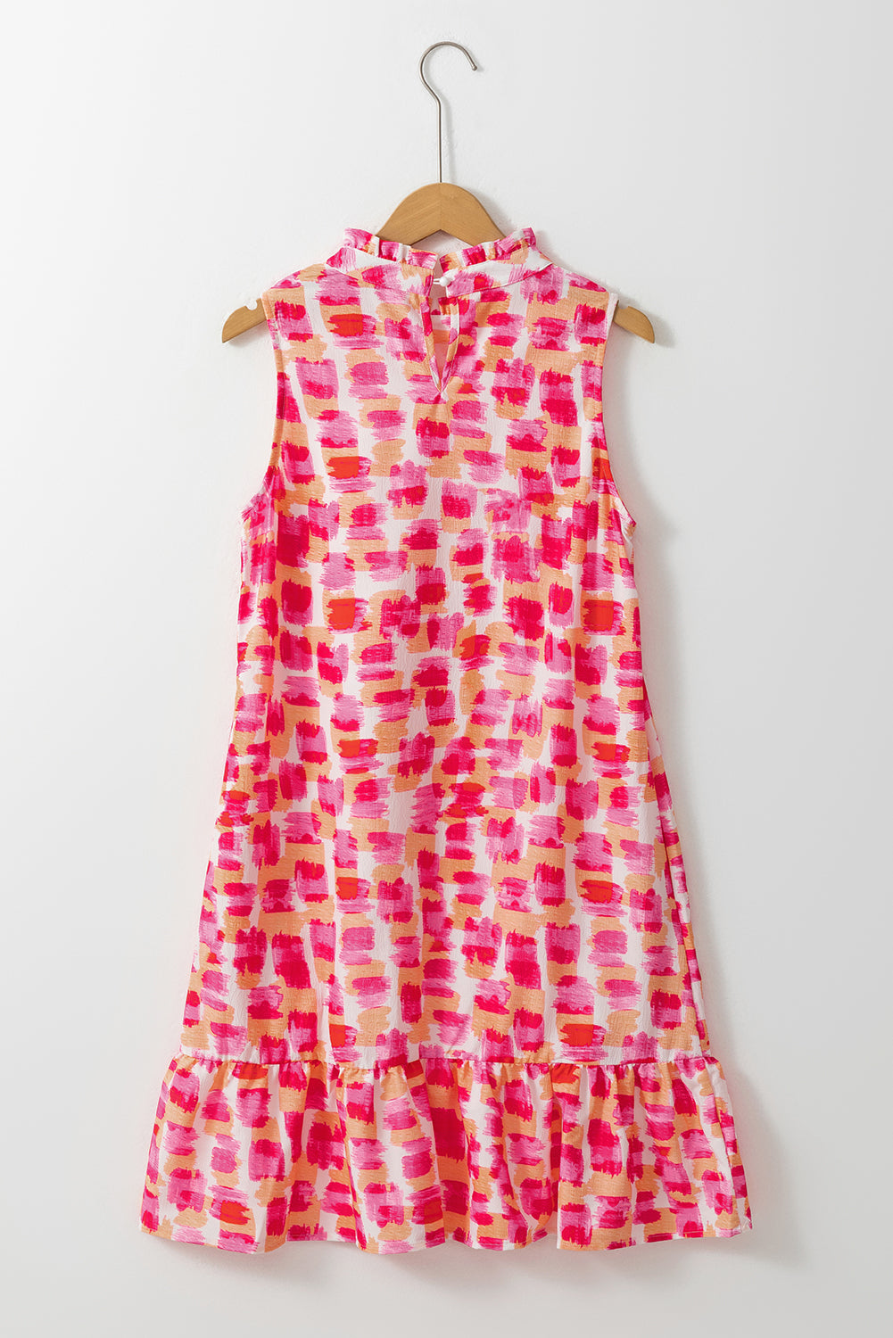 Chique roze abstracte print mouwloze mini-jurk met flirterige volanthalslijn