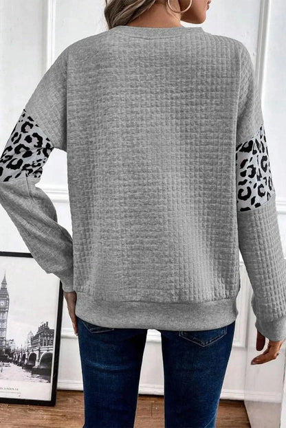 Chique luipaardprint sweatshirt met lange mouwen en comfortabele ronde hals