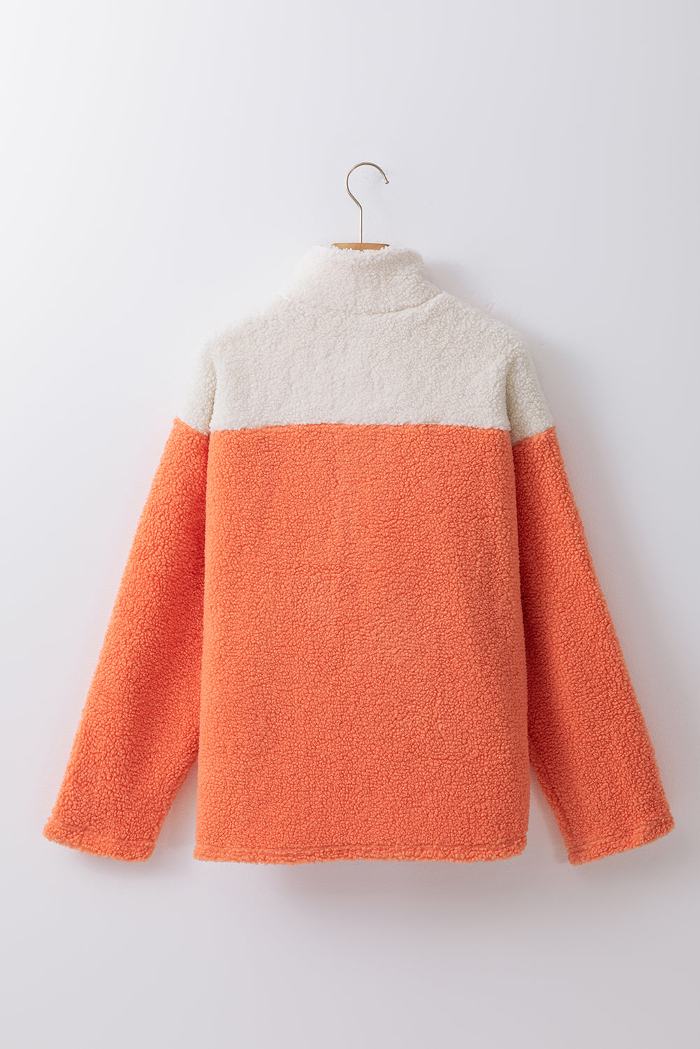 Levendig oranje Sherpa-sweatshirt met kleurblokken en trendy halfritsontwerp