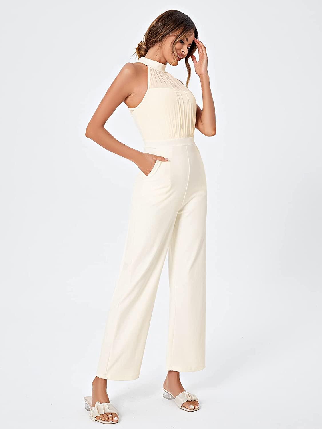 Prachtige halter mouwloze crème beige wijde pijp jumpsuit