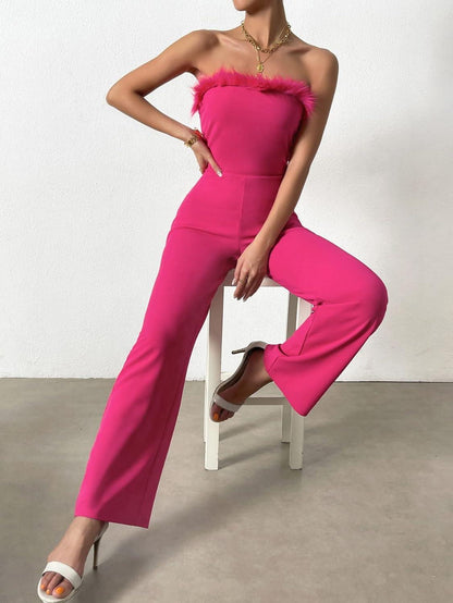 Strapless roze jumpsuit met veren