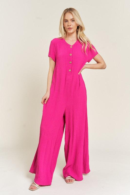 Loose Fit Fuschia Pink Textured Short Sleeve Jumpsuit - ZyraLux