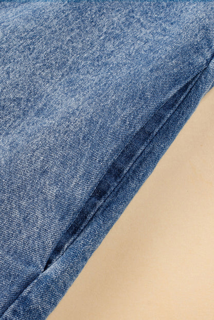 Chique blauwe minerale denimjurk met omgeslagen mouwen en trendy gerafelde zoom