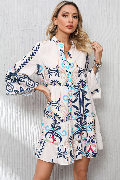 Chique witte tribal print mini-jurk met geknoopte mouwen