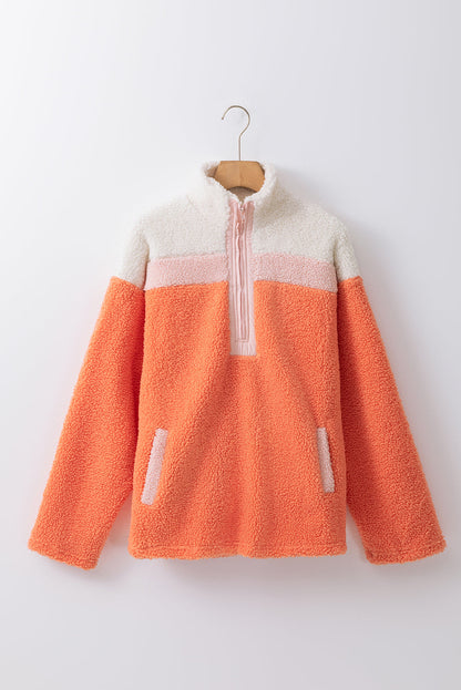 Levendig oranje Sherpa-sweatshirt met kleurblokken en trendy halfritsontwerp